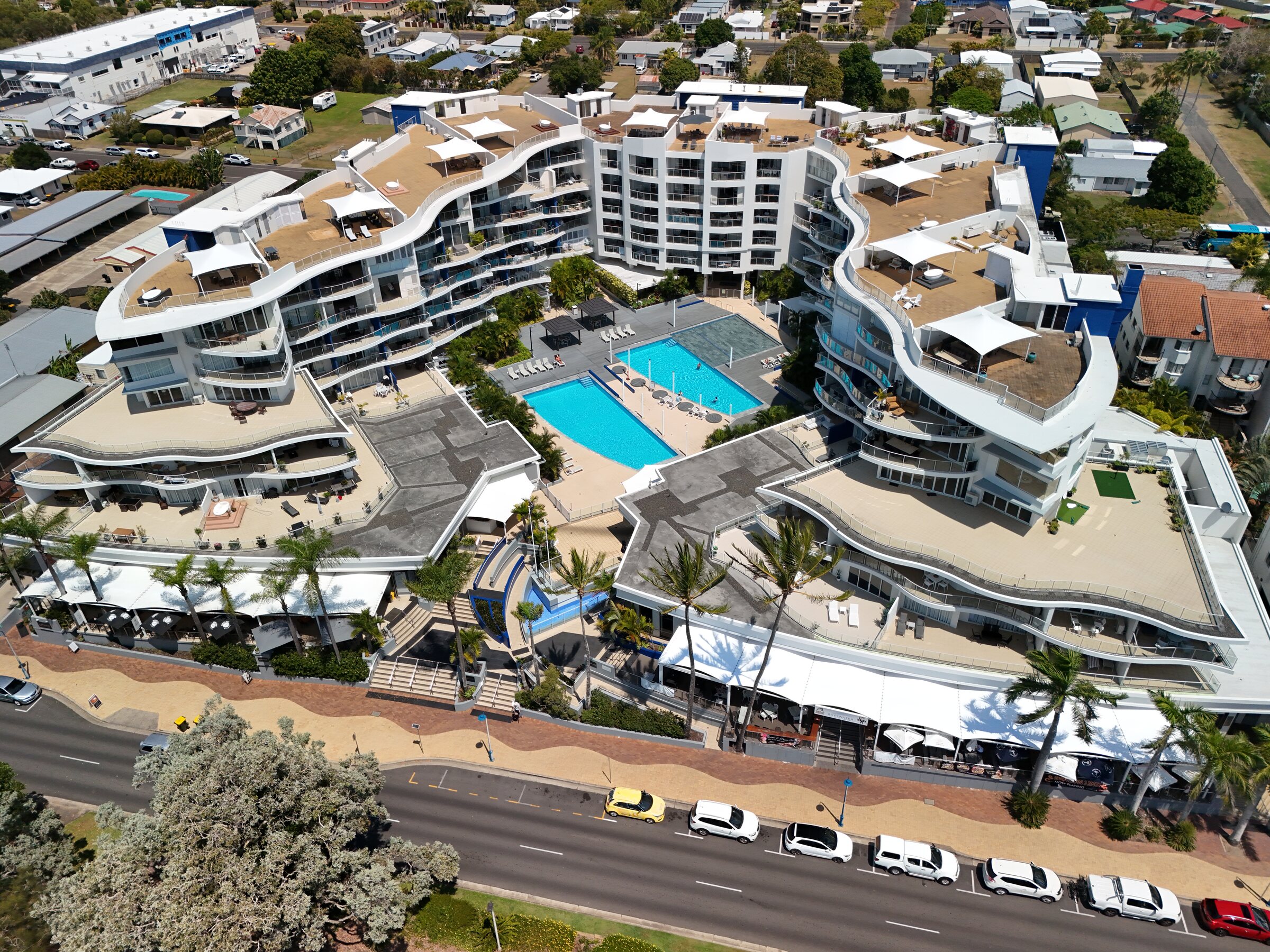 Aerial view of beachfront resort and event venue